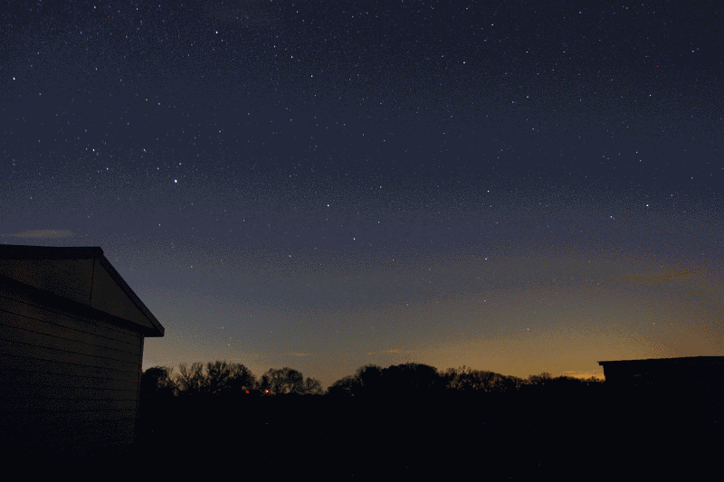 Rising moon, summer triangle star trails.gif