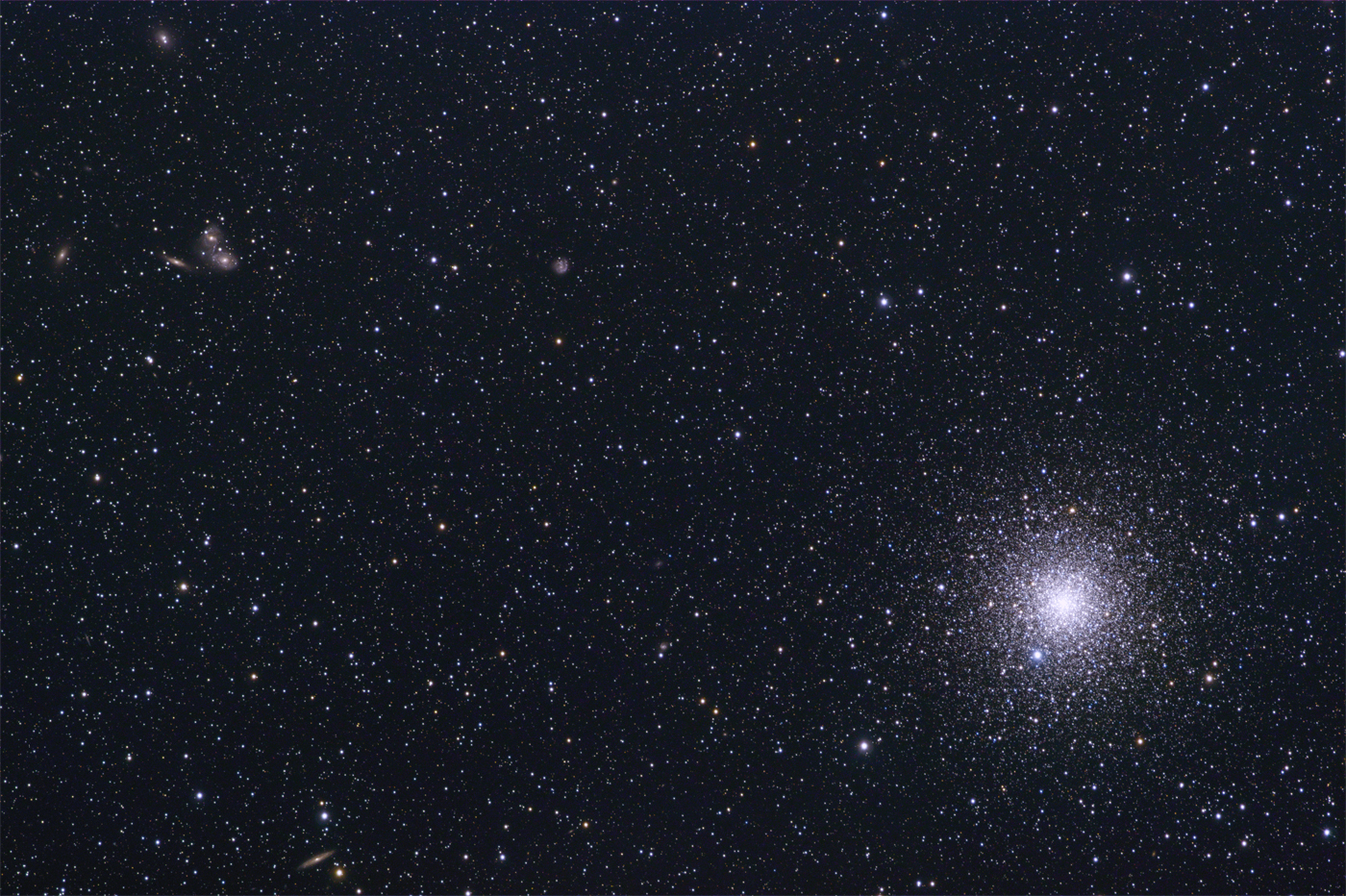 NGC 6752 and interacting galaxy group in Pavo