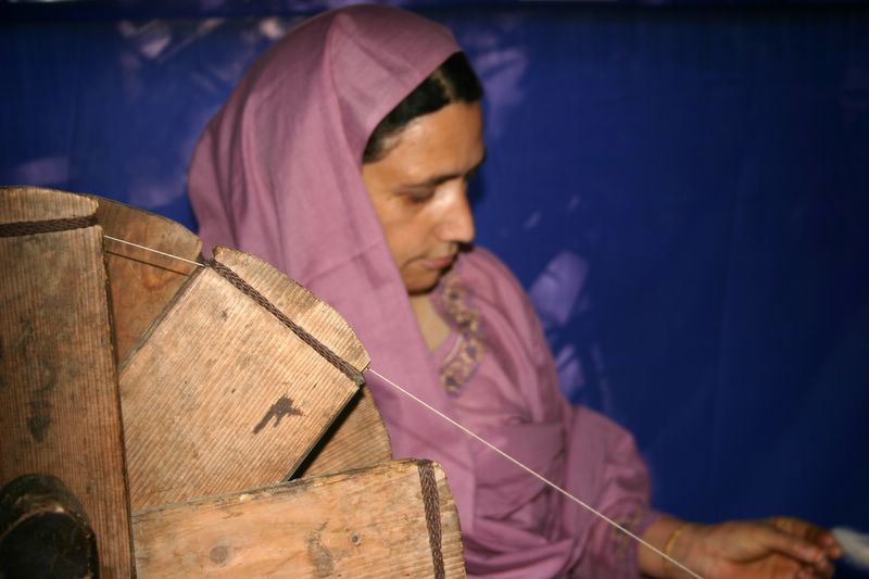A weaver, Dilli Haat, Delhi