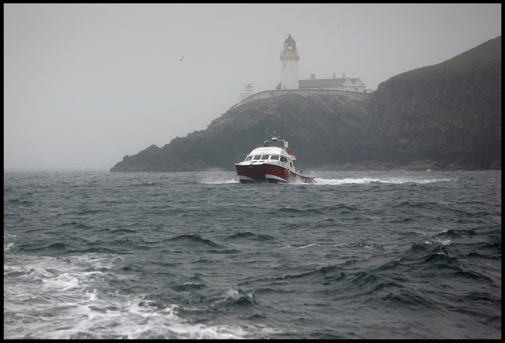 Taking the boat around Noss