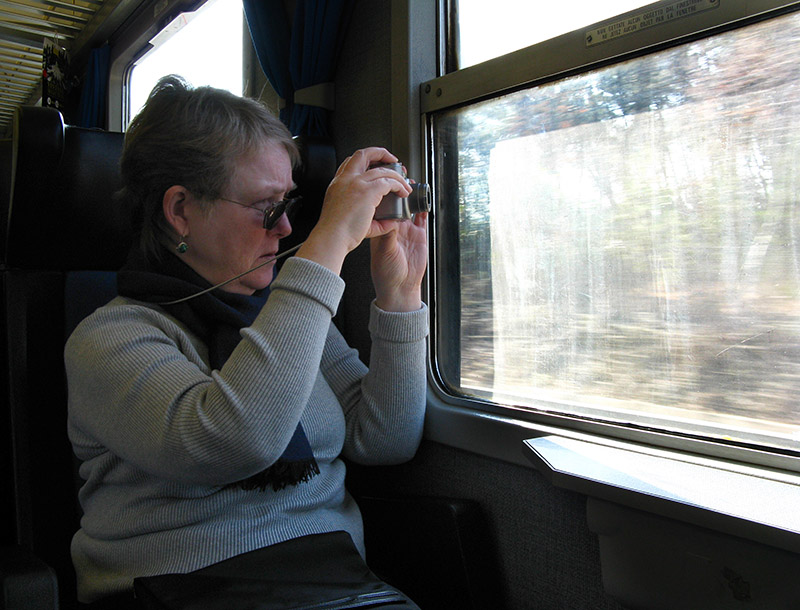 Margaret capturing a view from the train .. A3888