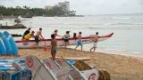 Getting the outrigger into the water, 1