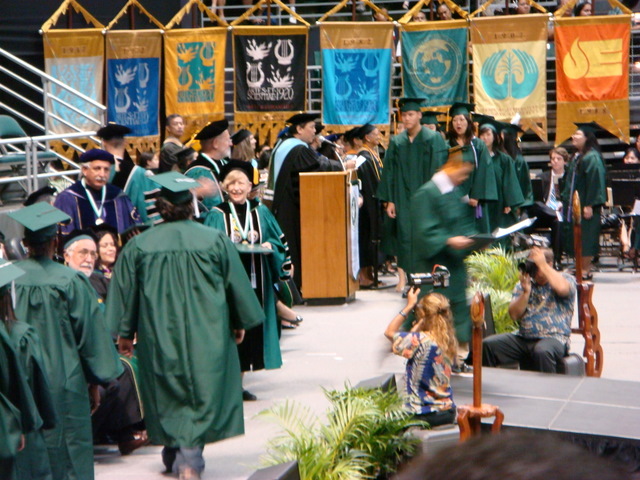 Clint coming up to Stage to Get Diploma