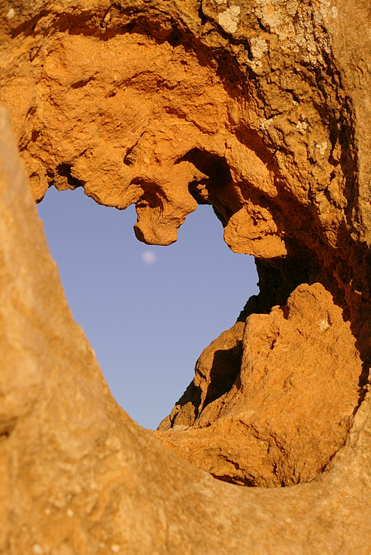 The moon through a pinnacle window