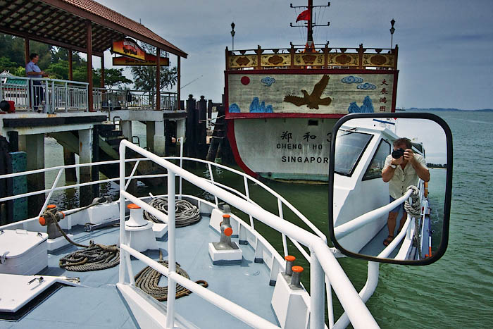 tude for two Boats & Photographer