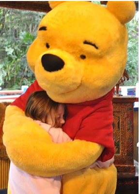 Big girl Rory still loves a hug from Pooh