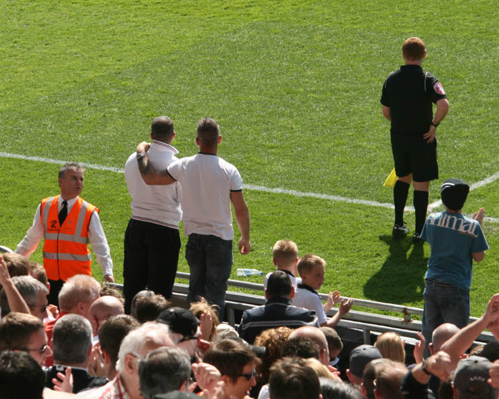 Oi- Sit Down at the Front!