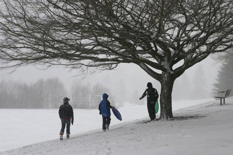 Sledding to Church through Gabriel Park