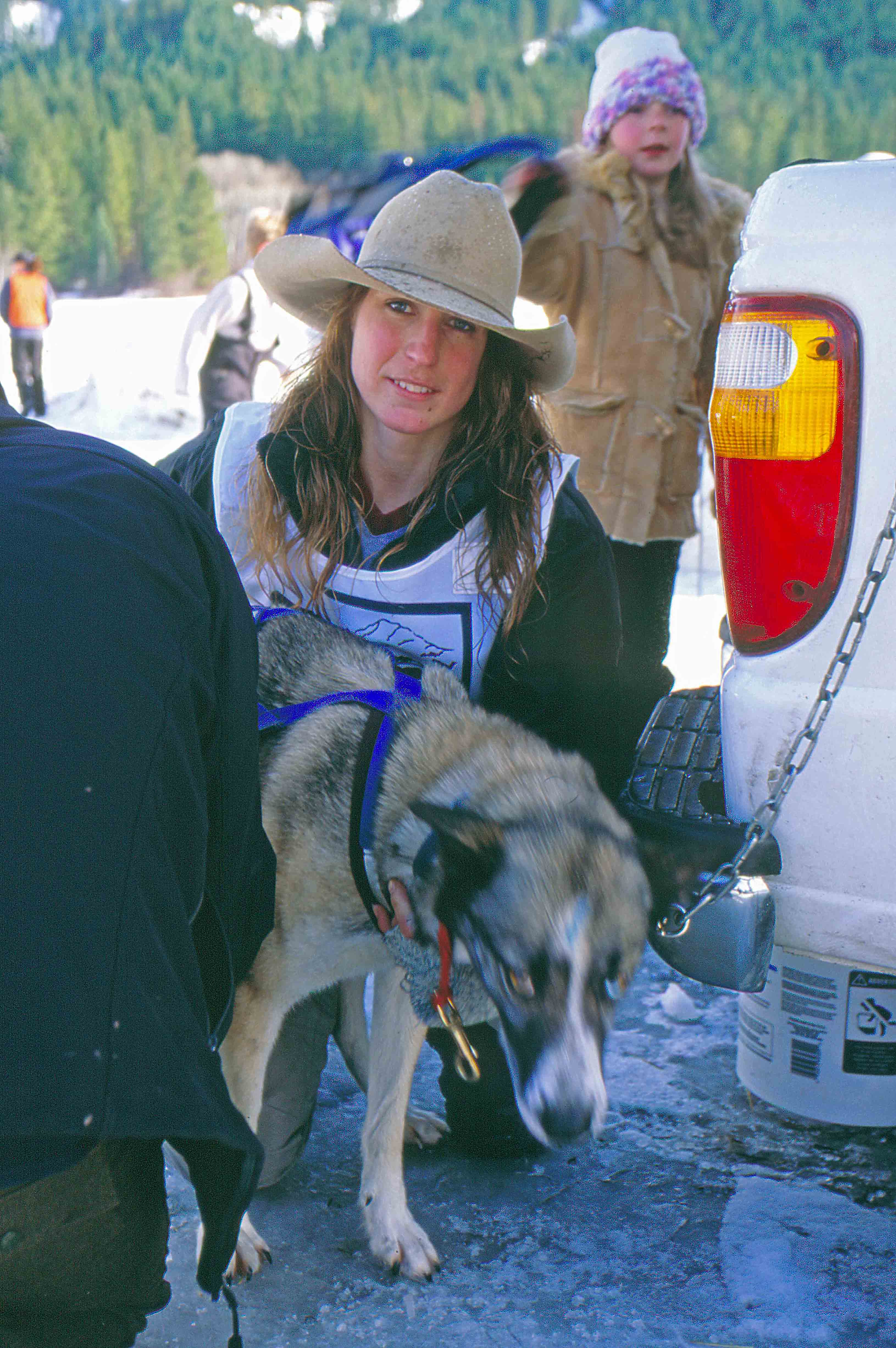 Christina Lyle WIth One Of Her Dogs ( As Her Daughter Watches In Background )