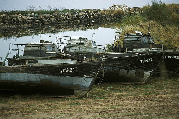 Boats pulled up on the lakeshore at an Old Believer village just inside Estonia