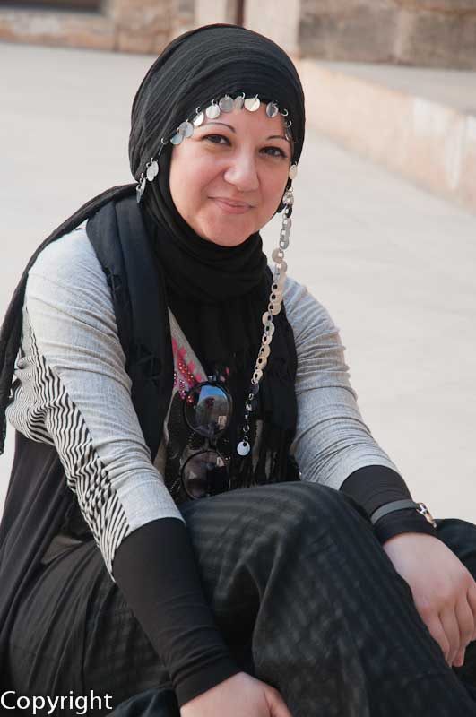 Young woman taking a break in Bayn al-Qasrayn, 'Palace Walk'