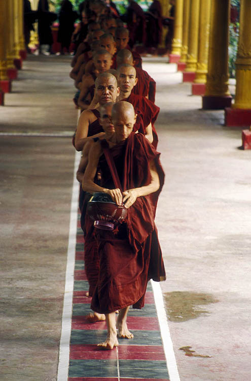 Monks line up for midday meal in Bago (Pegu)