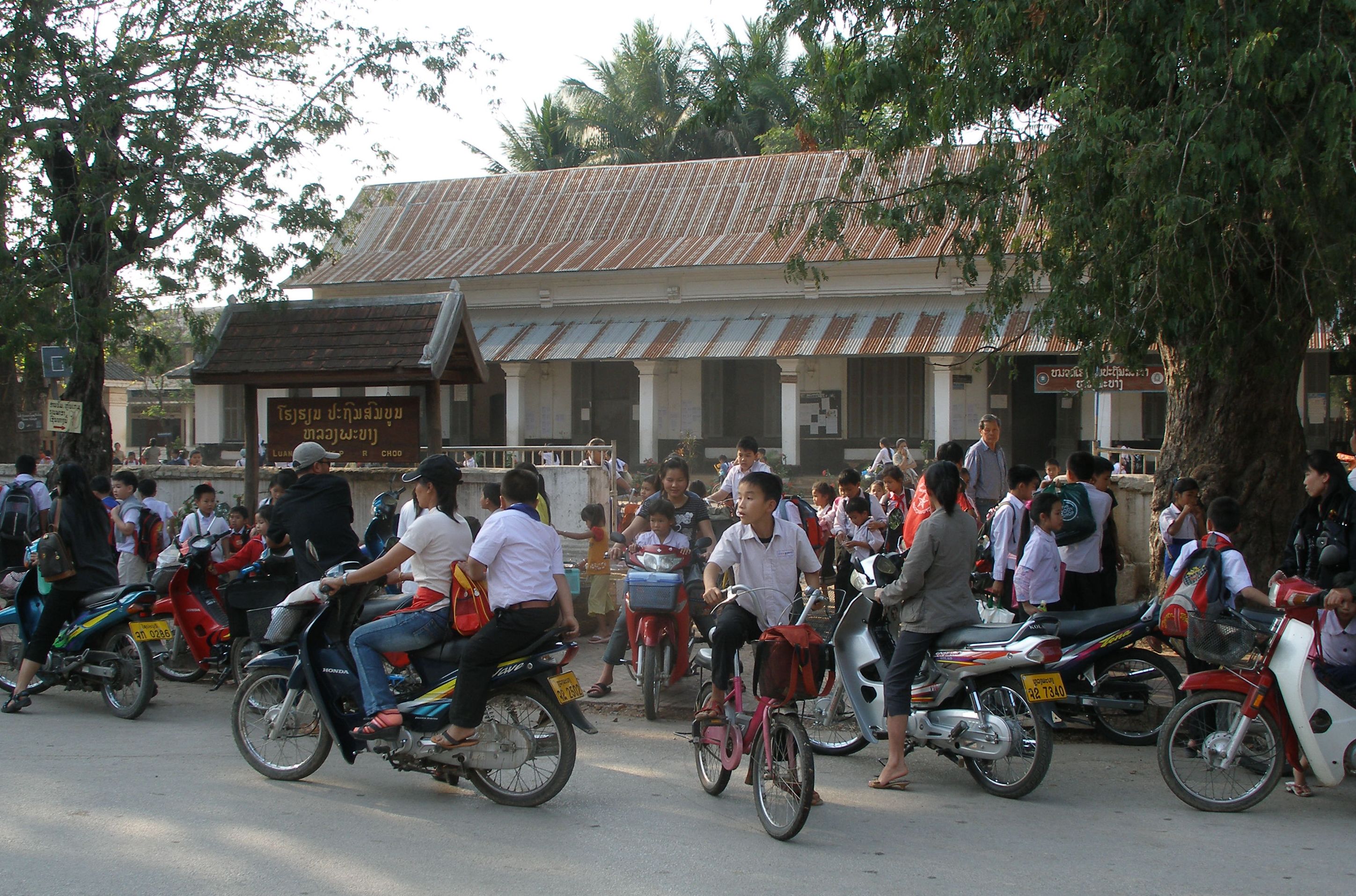 Schools out and the whole street was thronged with bikes and scooters