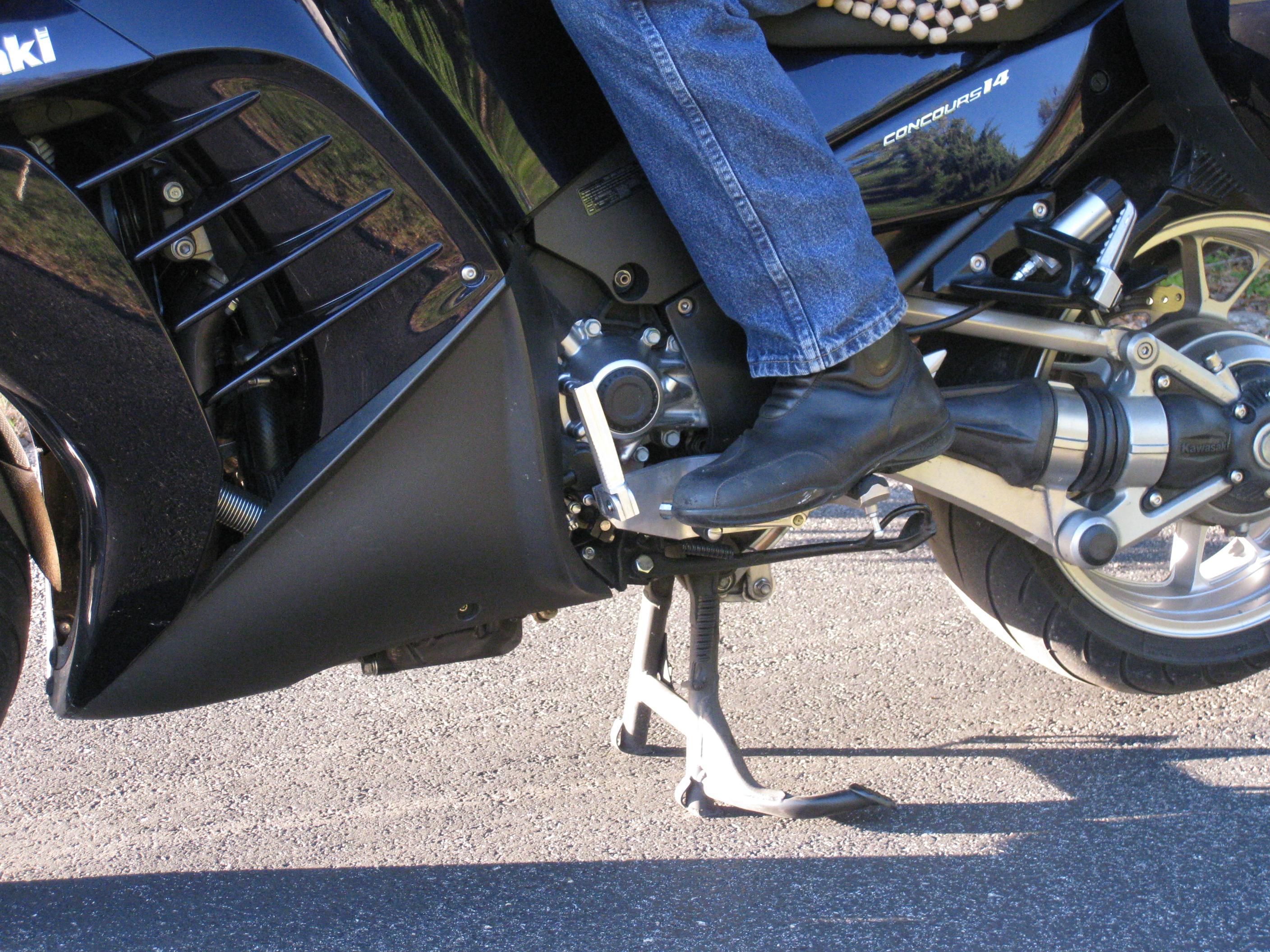 Feet off pegs from left side