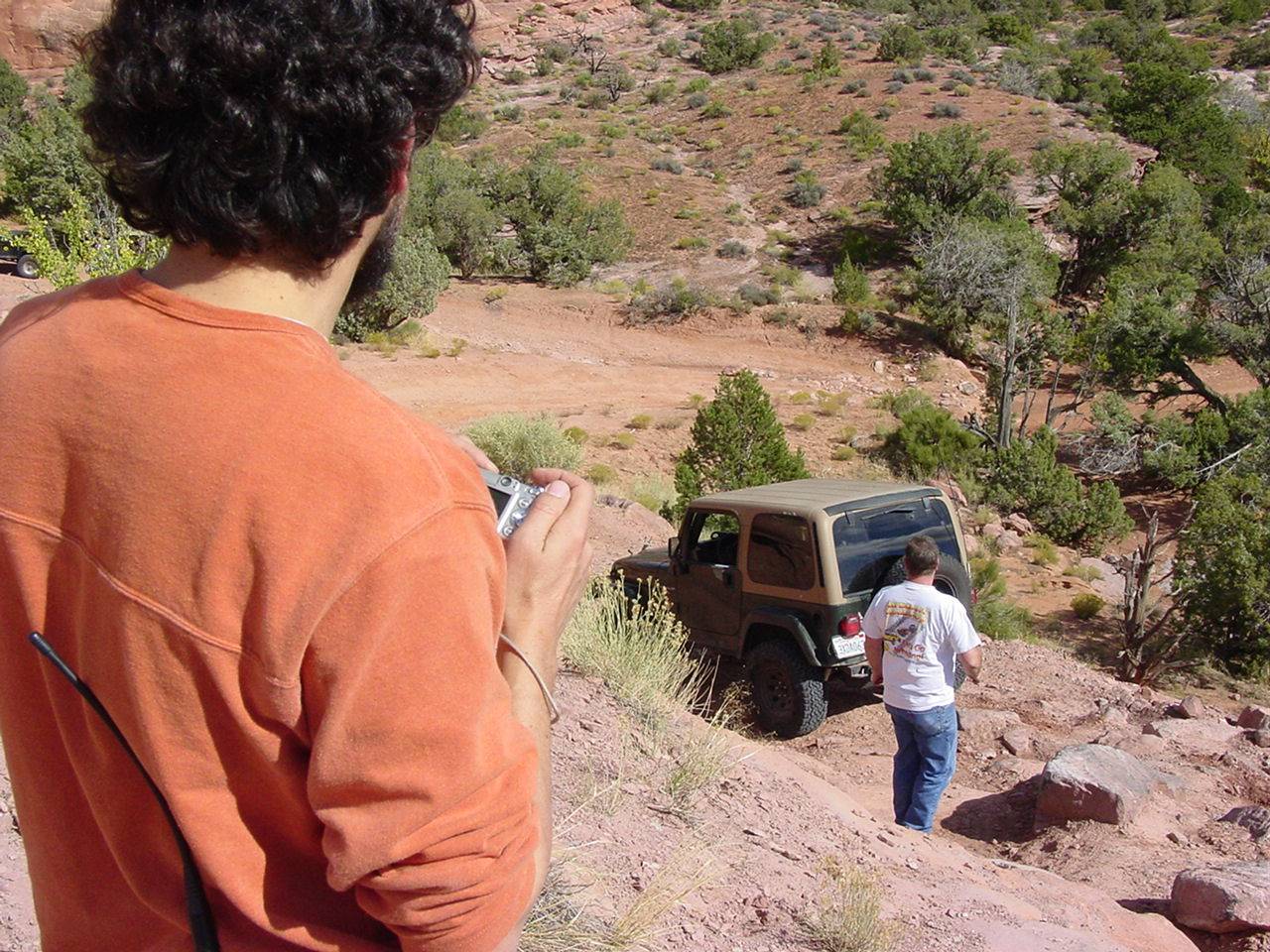 Montego watching his Jeep fly and bounce off the rocks !!!