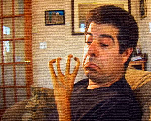 MIKE CHECKING HIS NAILS