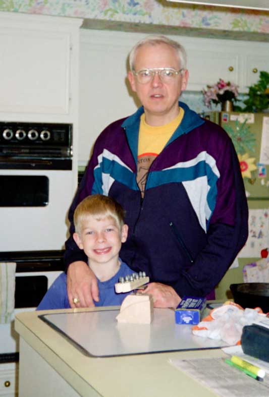 1995 - David and John Weighing Pinewood Derby Car