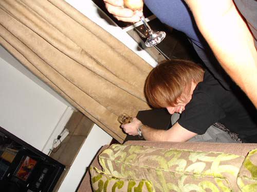 Nick ducking behind couch.jpg