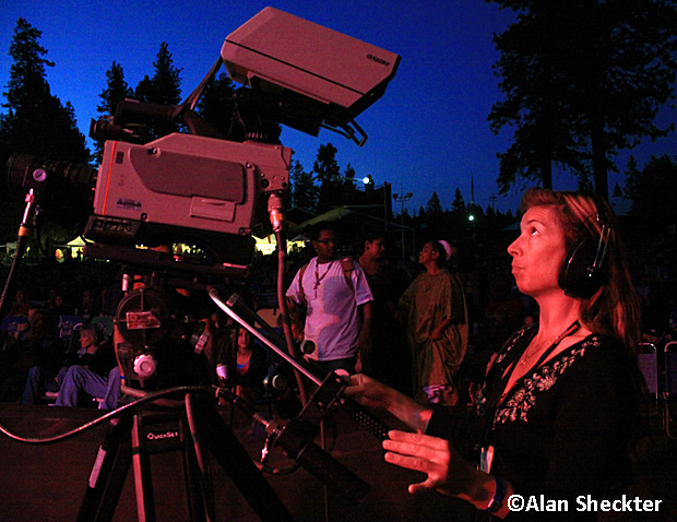 Video crew member capturing the action