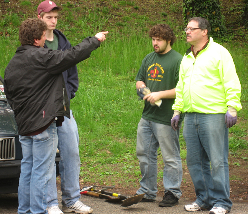 Scouts and leader getting their instructions