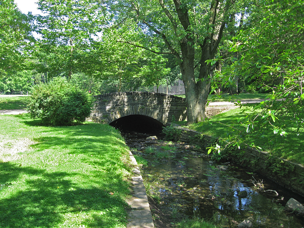 Vine Creek goes under the bridge in Bala Cynwyd Playground<br> and stays underground until Barmouth