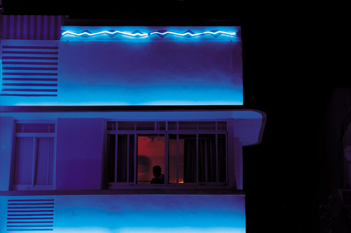 Man in window at nite