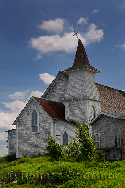 Anglican Christ Church with bent steeple and cross at Clarkes Head Gander Bay Newfoundland