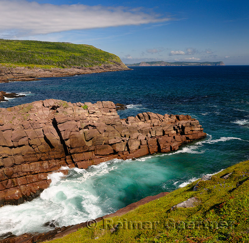 Rocky coast and surf at Cape Spear National Historic Site Newfoundland Canada