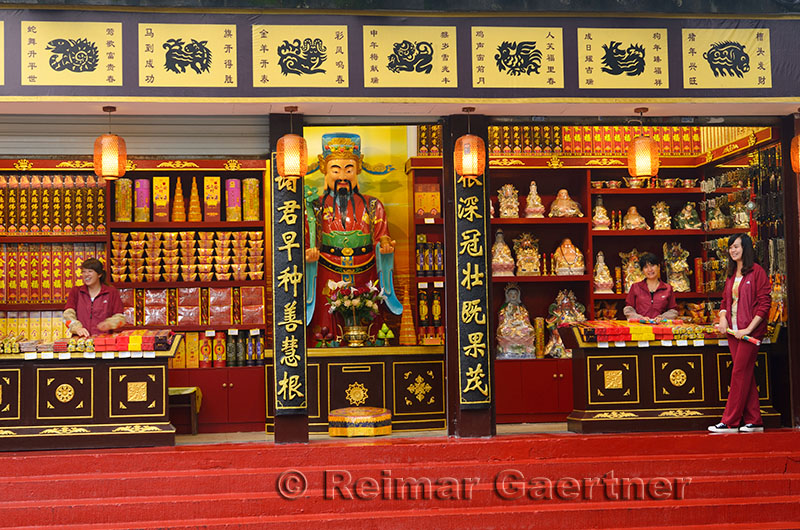 Smiling women working in the incense shop at Ling Yin Temple Hangzhou China