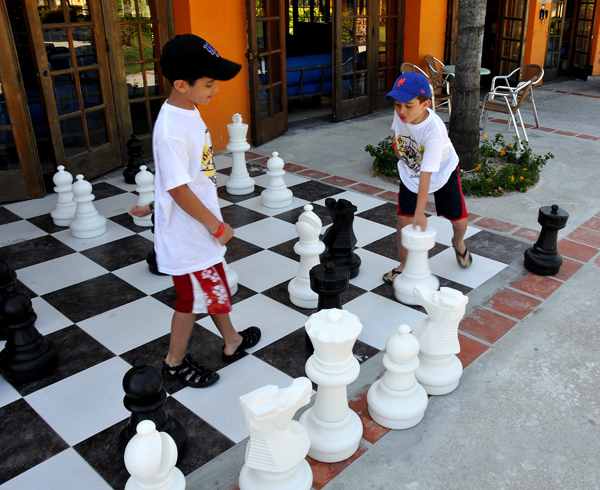 Boys playing Big Chess Game!