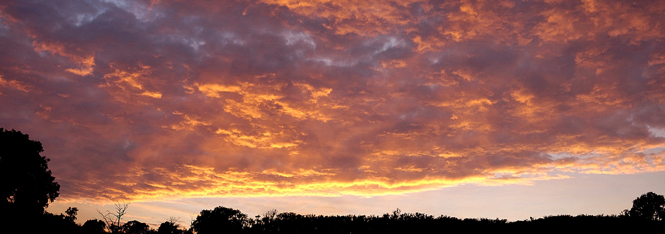 Sunrise - panorama of three shots.