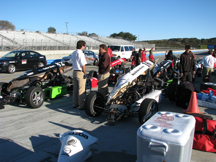Mechanics getting the cars ready