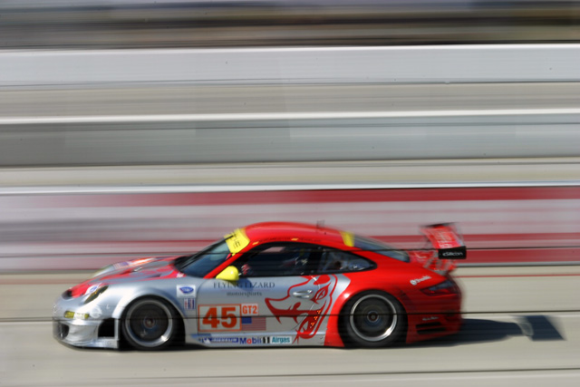 Flying Lizard 911 GT3 RSR headed down the front straight