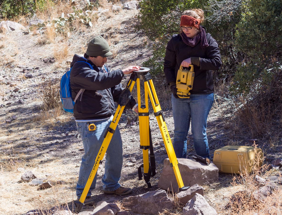 Chris Diaz and Kristin Corl, attaching the instrument