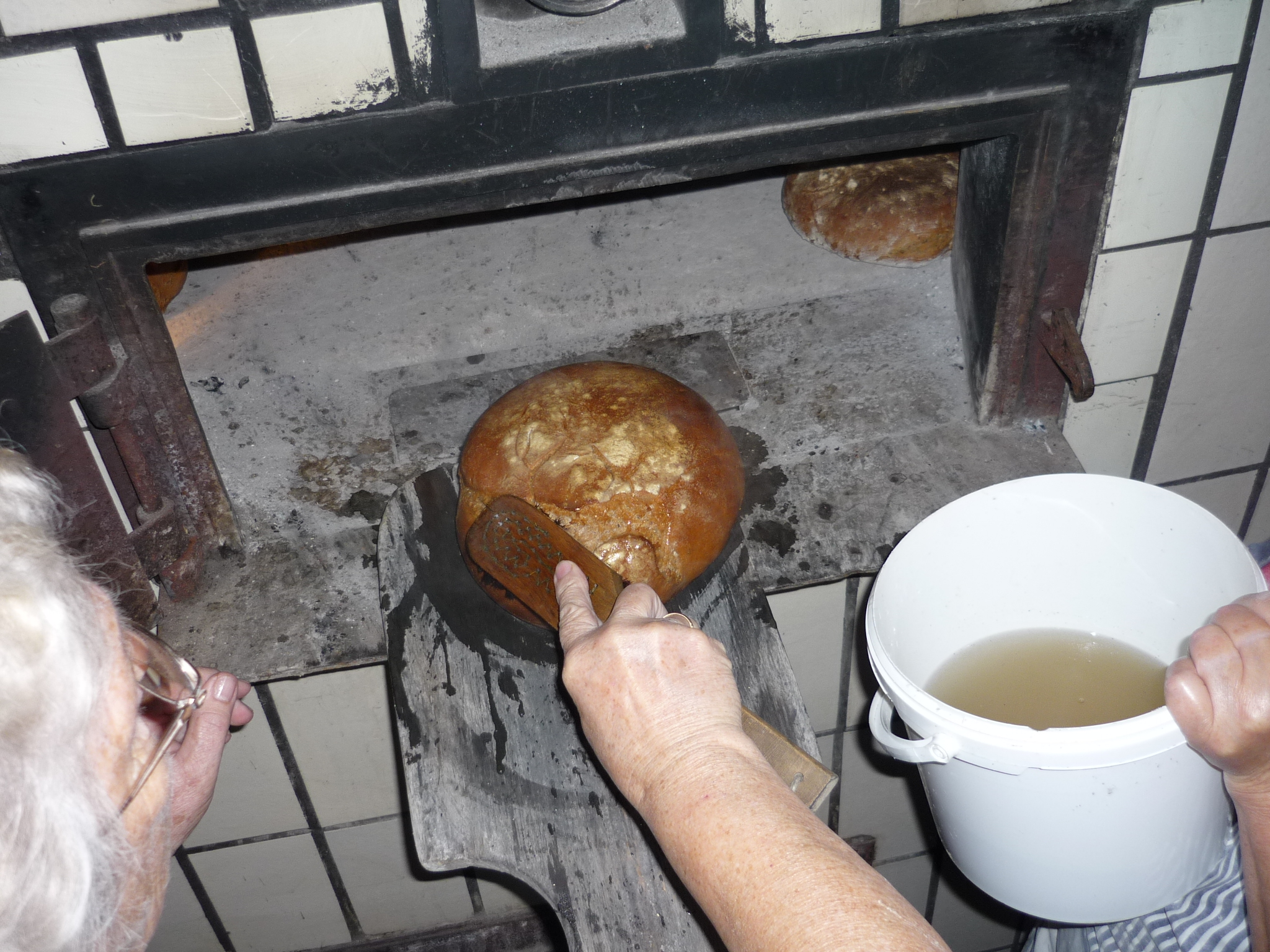 Giving the bread a salt water bath