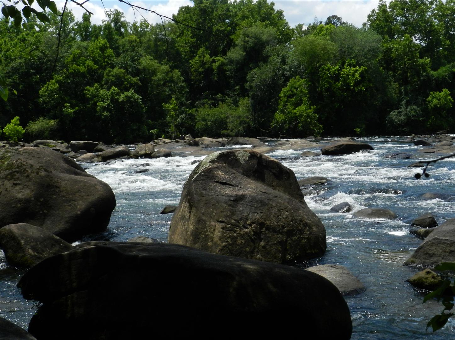 Rapidly rising water traps bathers here