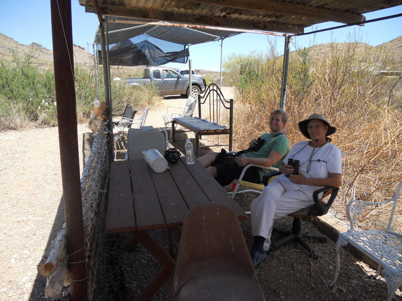 Kyle and Carolyn Ohl watching the action. 101 degrees in the shade.