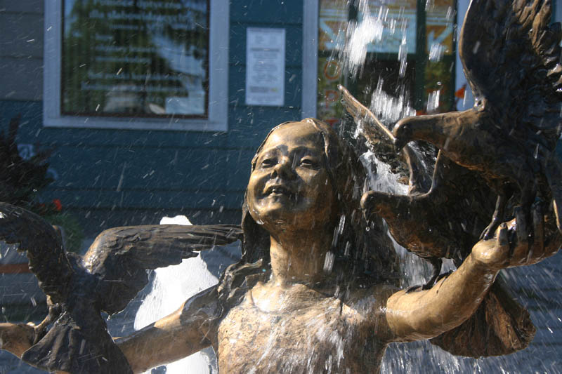 Little girl and birds - fountain