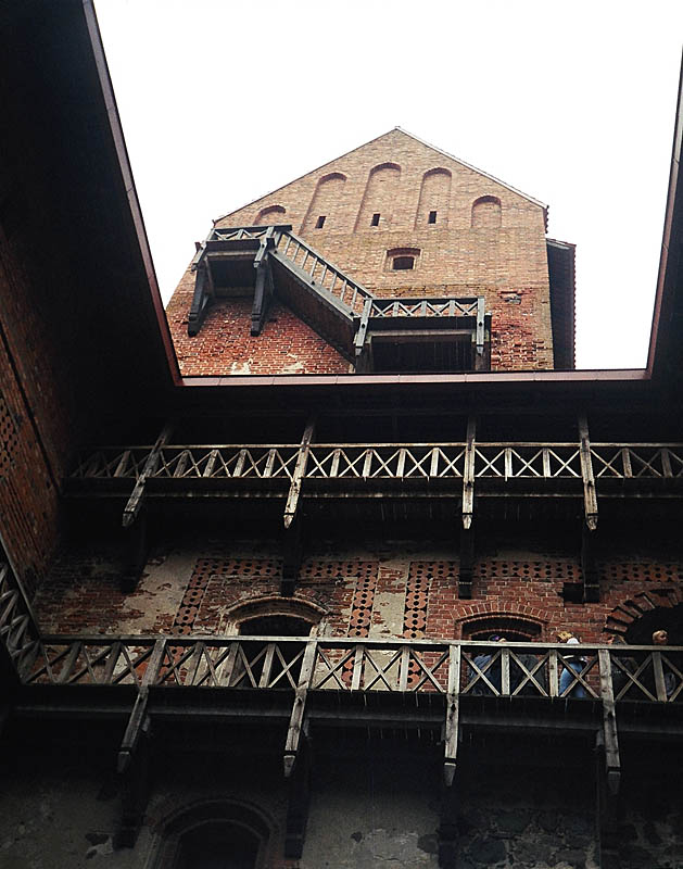 The inner yard of the palace and its wooden stair galleries