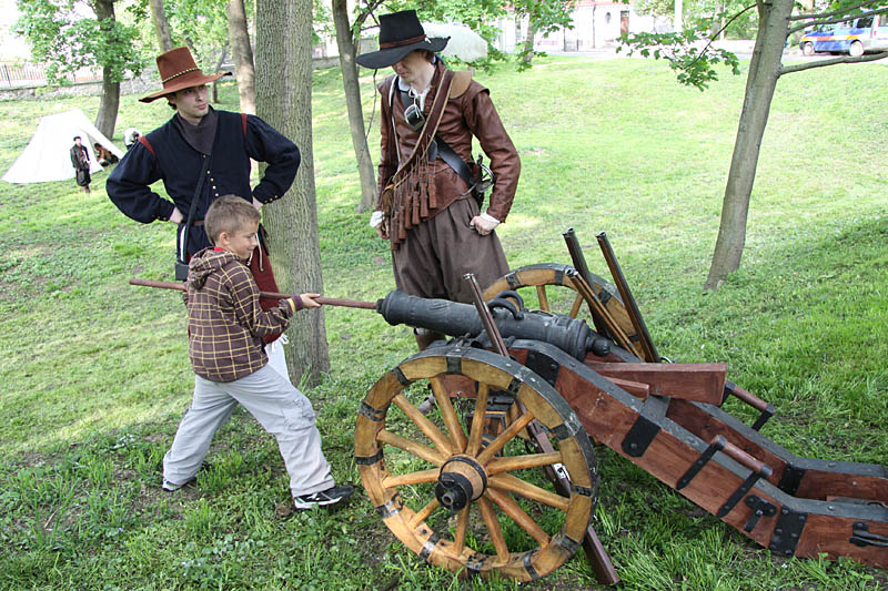 Young boy try to gun load