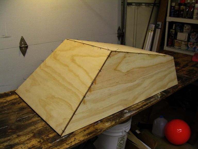 Panels of quarter inch fir plywood stitched together.