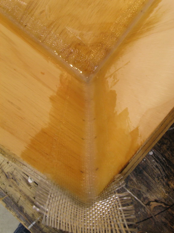 Detail of a taped seam; epoxy/glass/silica underneath.