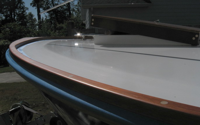 First coat of clear satin LPU on the toerail. Matte finish area inside will have nonskid on it.