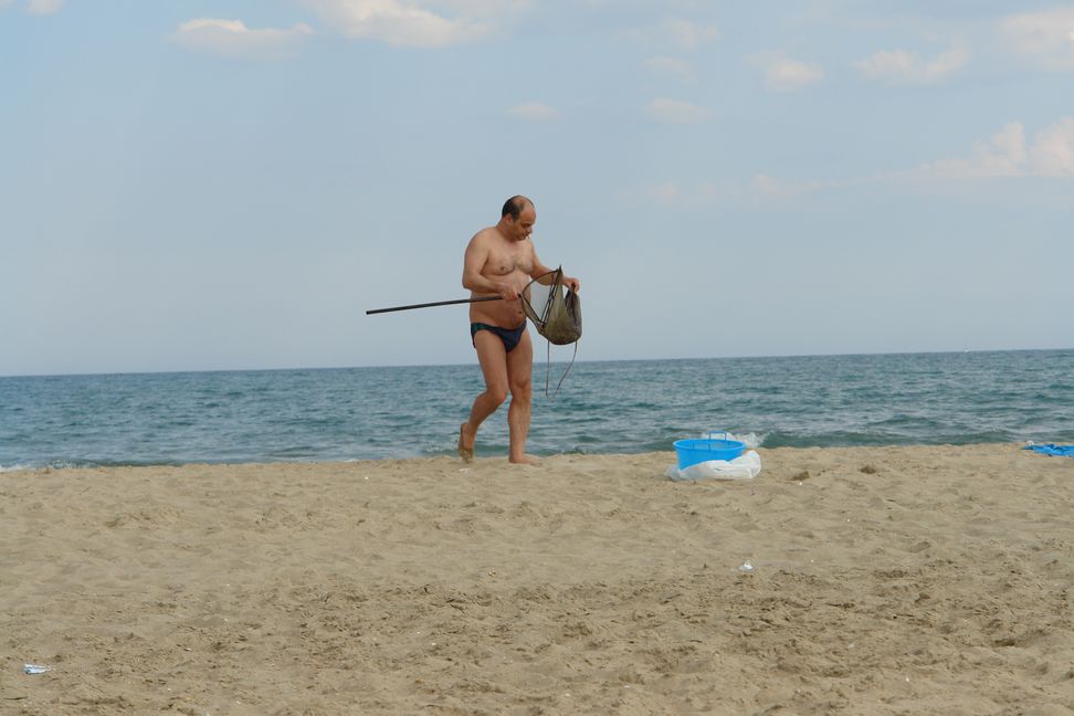 Gathering seashells for food