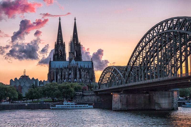Cologne Cathedral and Hollenzollern Bridge at sunset