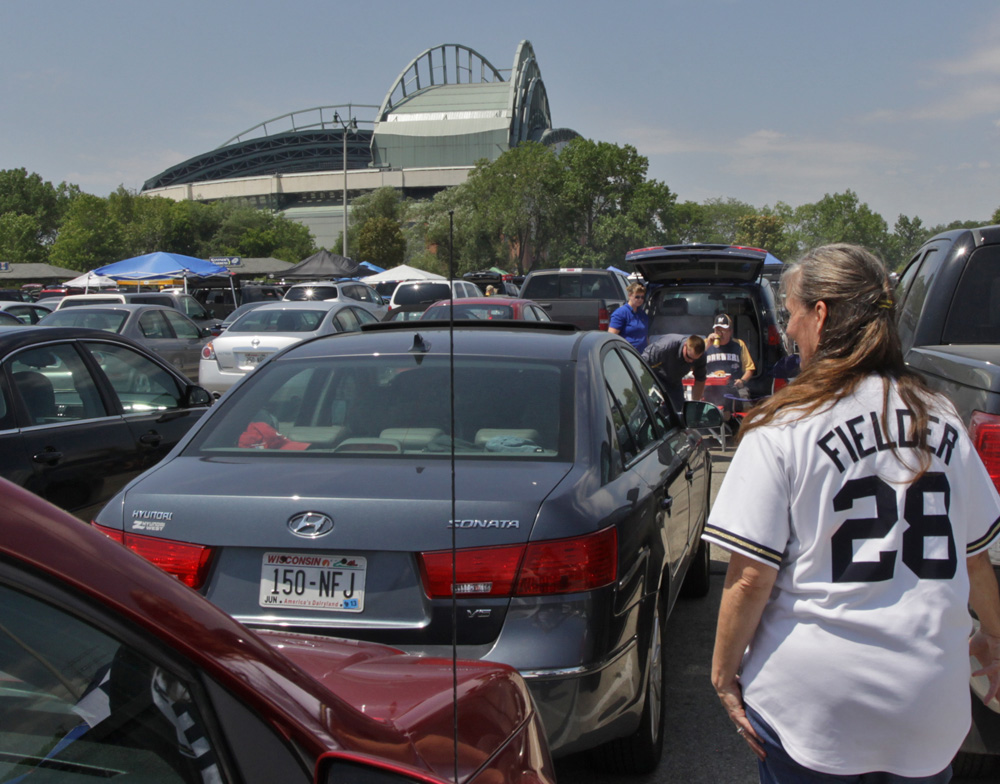 Princess Fielder making her way through the Forest of Tailgate parties to a Brewers game. (Brewers 4, Cardinals 3)