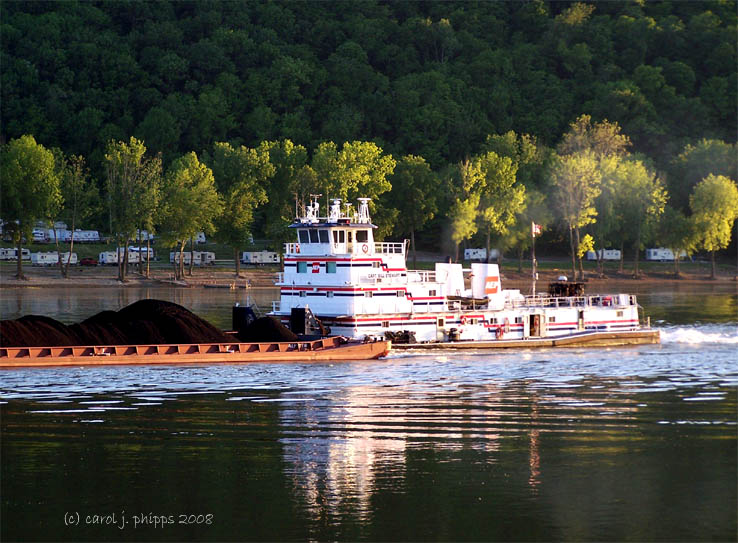 Tug Boat Pushing Coal.