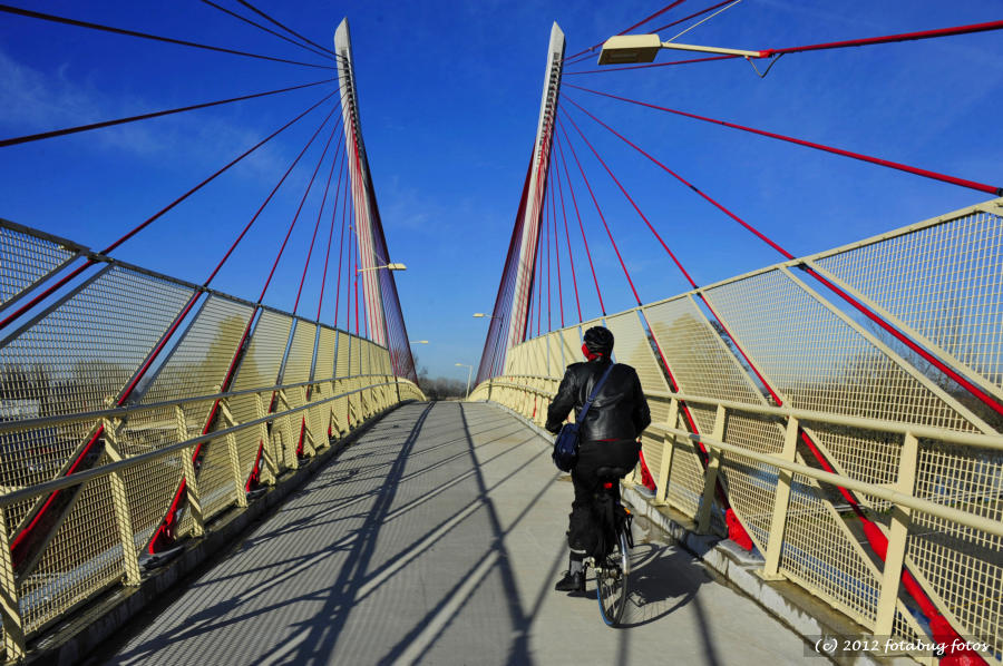 Biking Over Delta Ponds Bridge