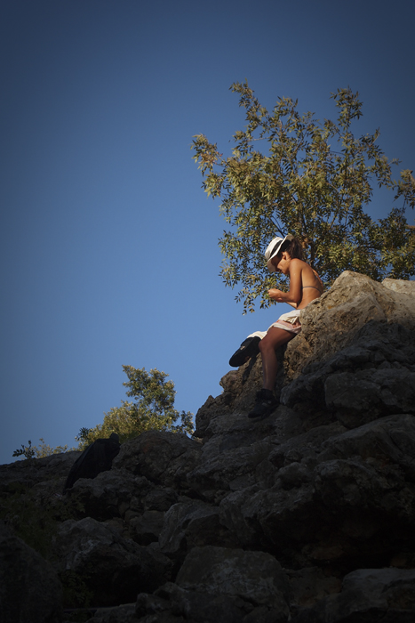 sitting on the top of the rock...