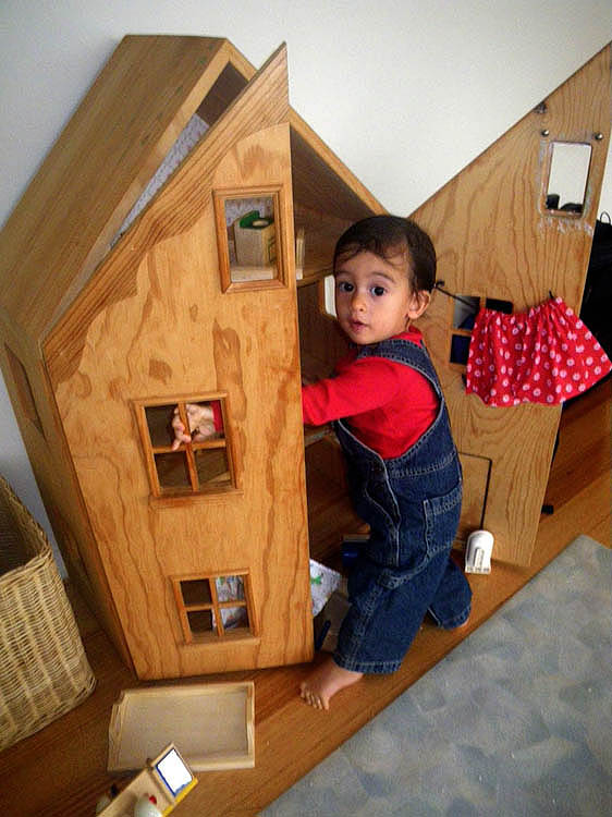 Ace likes the dolls house